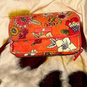 Used Vera Bradley wallet  2 zip up compartments 9 card holders & several pockets